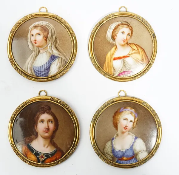 A set of four small Continental porcelain circular plaques, probably German, late 19th century, each painted with a head and shoulders portrait of a