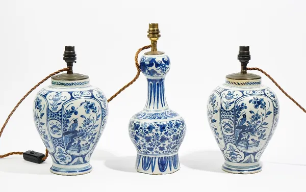 A pair of Dutch Delft blue and white vases adapted as lamps, late 18th/19th century, each ovoid body painted with panels of birds in branches, vases 2