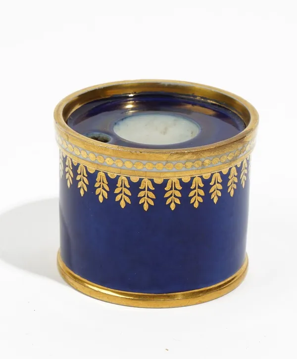 A Sevres blue-ground inkwell, circa 1821, of drum shape with gilt borders, blue interlaced L's mark enclosing Sevres 21, painted 12 m.21 and 14.J. et