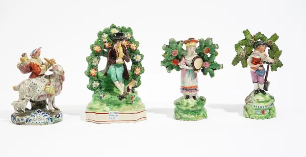 Four Staffordshire earthenware figures, circa 1820-30, comprising; a  Salt pearlware figure of a `Gardener', 15cm. high; a pearlware figure of a girl