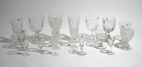 A group of seventeen various drinking glasses, 19th and 20th century, including rummers and wine glasses, 8.25cm. to 18cm. high, (17).