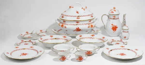 A Herend porcelain `Chinese Bouquet Rust' pattern part dinner and coffee service, comprising; an oval soup tureen and cover ( 38cm.wide across handles