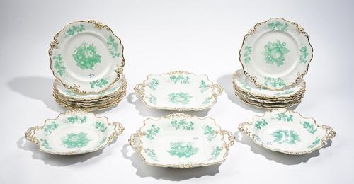 A Ridgway porcelain part dessert service, circa 1830, each piece printed in green with a central group of fruit inside a border scattered with fruitin
