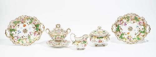 A group of Ridgway tea and dessert wares, circa 1835, each painted with scattered flowers amongst gilt-edged green leafy scrolls against a gilt diaper