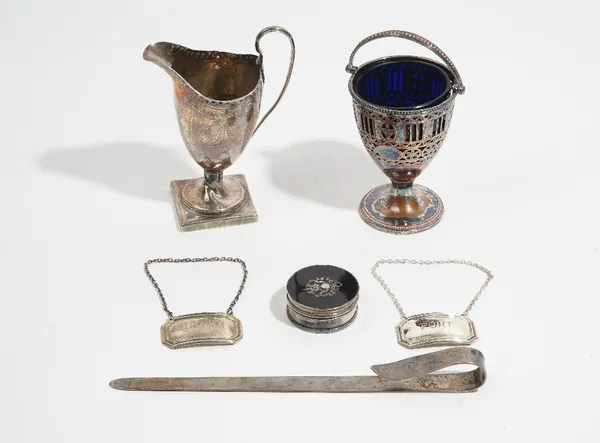 Silver and silver mounted wares, comprising; a ruler, Birmingham 1910, a helmet shaped cream jug, London 1794, a circular box and cover with inlaid to