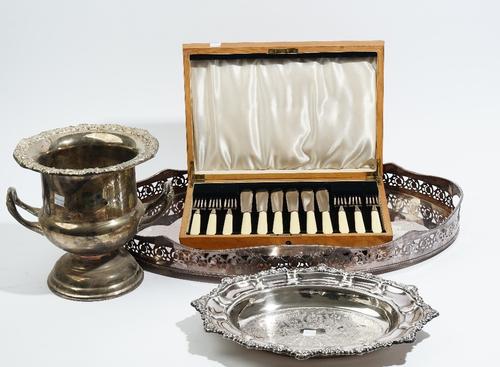 A group of plated wares, comprising; a large oval twin handled gallery tray, a set of six pairs of fish knives and forks, in a wooden case, a shaped o
