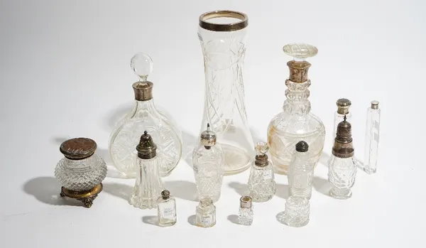 A silver mounted cut glass vase, London 1928, two silver mounted cut glass decanters and twelve further items of glassware, mostly with silver or plat