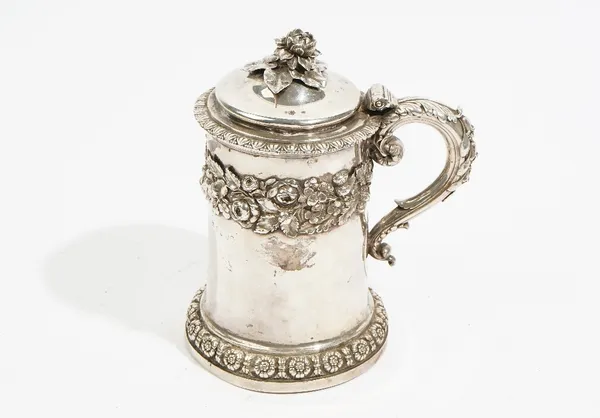 A George IV silver tankard, by Edward, Edward Junior, John & William Barnard, London 1829, of tapered cylindrical form, the domed hinged cover with a