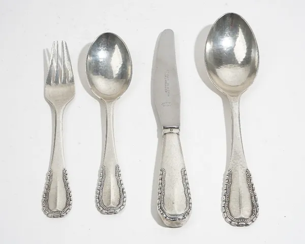 Georg Jensen; Viking pattern four-piece sterling silver place setting, Copenhagen 1927, tablespoon, table knife, dessert spoon and a desert fork of la