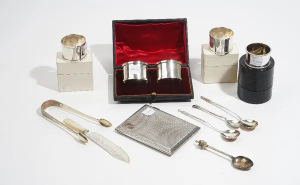 Silver and silver mounted wares, comprising: a rectangular cigarette case, a pair of napkin rings, Chester 1918, cased, a pair of napkin rings engrave