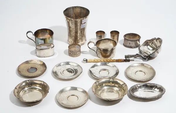 A group of foreign and plated wares, comprising; German; a pair of spirit tots, a pair of glass holders, two napkin rings, a pair of bowls and a shape