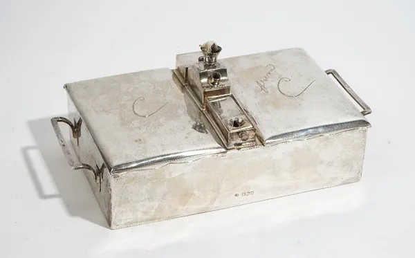 A late Victorian silver rectangular, twin compartment, twin handled table cigar box, the two hinge lidded rectangular compartments wooden lined within