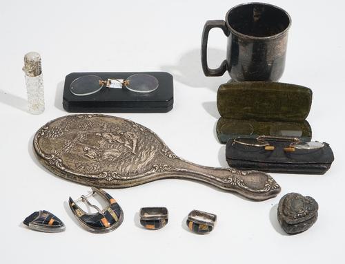 Silver and silver mounted wares, comprising; a christening mug, Birmingham 1932, a hand mirror decorated with figures in a landscape, Birmingham 1904,
