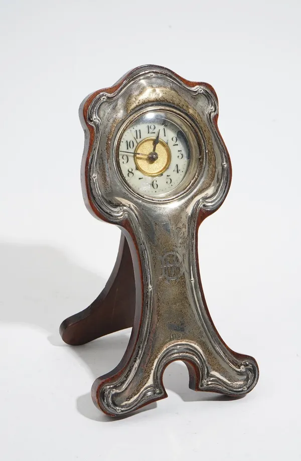 A silver fronted wooden cased strut backed clock, of Art Nouveau design, the front mongram engraved and detailed 1922, Chester 1921, height 20.5cm.