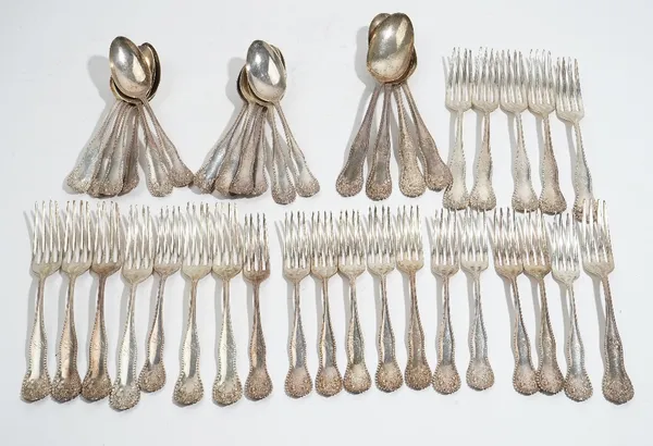 An American Sterling silver part table service, comprising; twelve dessert forks, twelve dessert spoons, twelve table forks and four tablespoons, comb