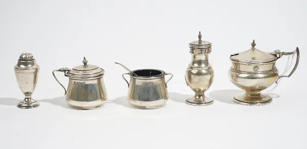 Silver, comprising; a mustard pot and a matching pepperette, decorated with a border of flowers, Birmingham 1914, a mustard pot and a matching salt, B