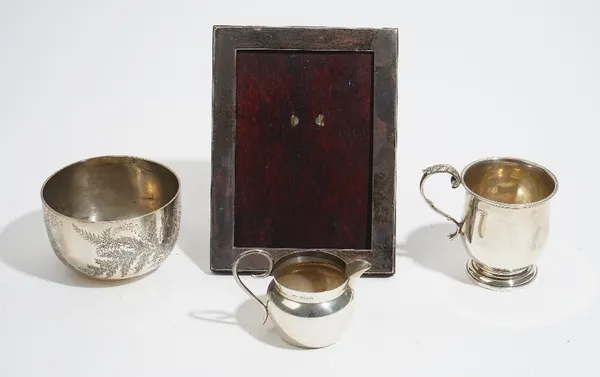 Silver and silver mounted wares, comprising; a Victorian sugar bowl, engraved with fern sprays, London 1884, a christening mug, Birmingham 1946, a cre