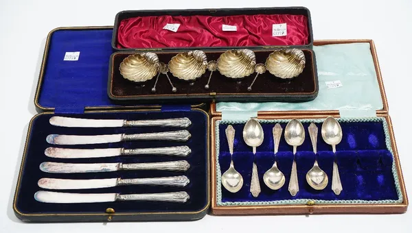 Silver and silver mounted wares, comprising; a set of four Victorian salts, each of scallop form, raised on three spherical feet, with four matching s