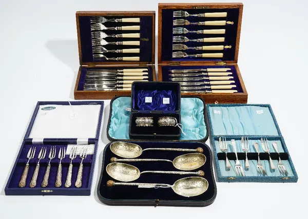 Silver, comprising; six pastry forks, various dates and two napkin rings, combined weight 136 gms, a set of six pastry forks, with loaded silver King'