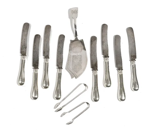 A silver fiddle pattern fish slice, London 1811, two pairs of silver sugar tongs, London 1826 and Sheffield 1921, combined weight 188 gms, also eight