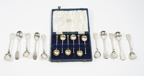 Three Irish silver fiddle pattern mustard spoons, crest engraved, Dublin 1855, seven further silver fiddle pattern mustard spoons, various dates and a