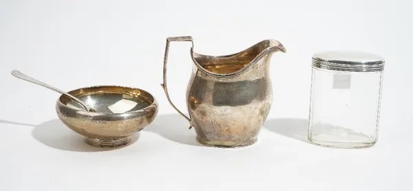 Silver and silver mounted wares, comprising; a George III helmet shaped milk jug, London 1808, a circular bowl, raised on a reeded circular foot, Birm