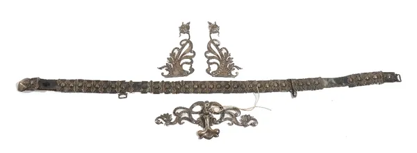 A Southern Russian niello decorated waistbelt and buckle, the leather belt fitted with niello decorated sliding links, detailed 84, the front with a c