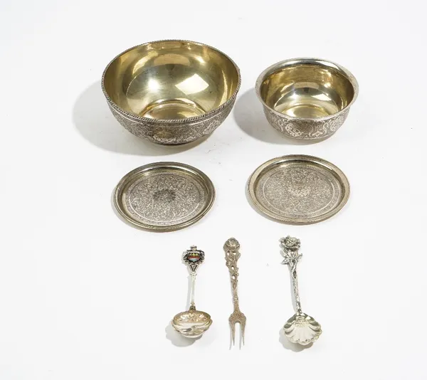 Foreign wares, comprising;  a Persian bowl decorated with a ropetwist rim, diameter 12.5cm, a smaller bowl and a pair of Persian dishes, diameter 8.7c