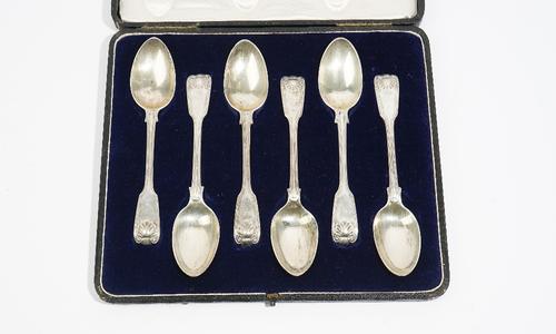 A set of six Victorian silver double struck, fiddle, thread and shell pattern dessert spoons, London 1845, combined weight 366 gms, with a case.