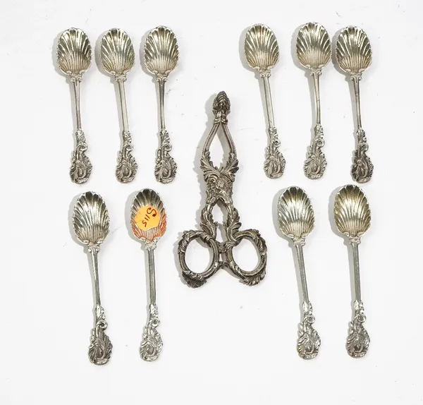 Ten cast leaf form teaspoons, apparently unmarked, probably from a tea equipage and a pair of Victorian sugar nips, with cast foliate decoration, Lond