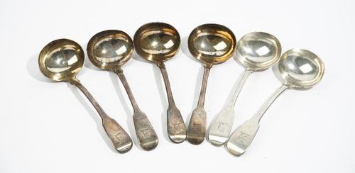 Six silver fiddle pattern sauce ladles, comprising: a pair London 1824, a pair London 1827, one London 1837 and one London 1838, combined weight 392gm