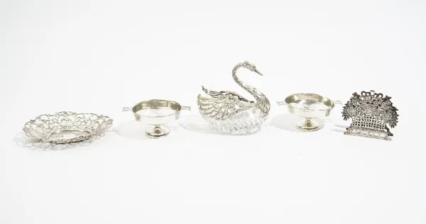 A group of foreign wares, comprising; a faceted glass bowl, modelled as a swan, a pair of twin handled circular bonbon dishes, an oval bonbon dish wit