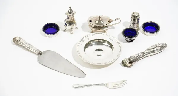 A group of silver and silver mounted wares, comprising; an Armada style dish, diameter 12cm, a mustard pot, a pepperette, a pair of circular salts hav