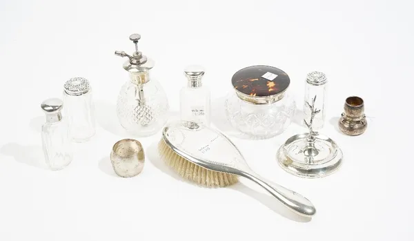 Silver and silver mounted wares, comprising; a hairbrush, Birmingham 1915, a ring tree stand, London 1922, a faceted glass powder bowl, Birmingham 192