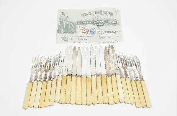 A set of twelve silver bladed dessert or fruit knives, with ivory handles, London 1939 and matching ten dessert or fruit forks, London 1938 and two ma