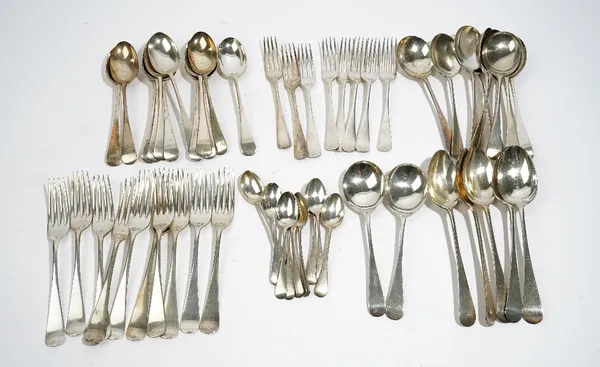 A silver Old English pattern canteen of table flatware, comprising; twelve soup spoons, twelve dessert spoons, twelve dessert forks, twelve table fork