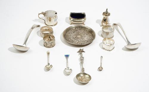 Silver, comprising; a pair of Old English pattern sauce ladles, Sheffield 1897, three various spoons, a cylindrical mustard pot, a salt with a blue gl