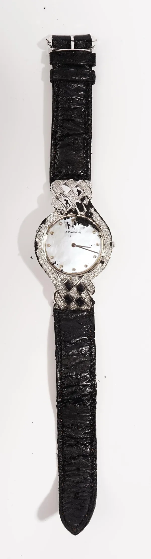 An A.Barthelay white gold and diamond set lady's dress wristwatch, the signed white dial with circular cut diamond set numerals, the bezel and the str