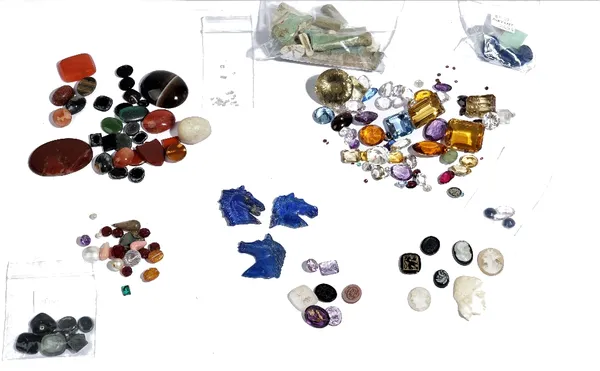 A quantity of loose gemstones, cameos, intaglios, three carved lapis lazuli horses heads, agates, antiquities and further items, (qty).