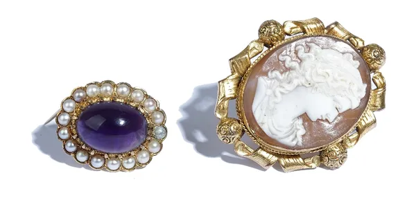 A 9ct gold brooch, mounted with an oval cabochon amethyst to the centre, in a surround of half pearls, London 1968 and a Victorian oval shell cameo pe