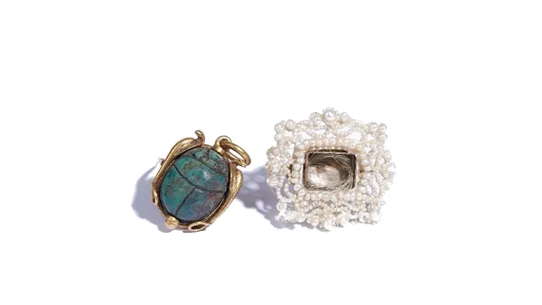 A Victorian gold brooch/pendant, mounted with a faience scarab and a seed pearl mourning brooch, of shaped rectangular form, the central locket lackin