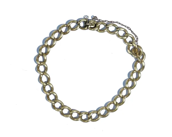 An 18ct gold curb link bracelet, on a later converted snap clasp, length 23cm, gross weight 32.8 gms.