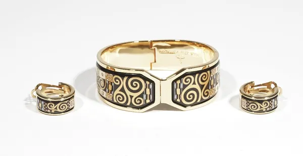 A Michaela Frey Wien gilt metal and enamelled hinged bangle from the Hommage à Gustav Klimt range, complete with box and paperwork; and a pair of gilt