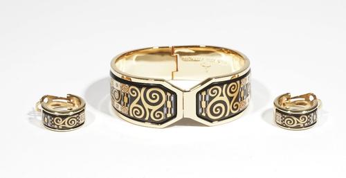 A Michaela Frey Wien gilt metal and enamelled hinged bangle from the Hommage à Gustav Klimt range, complete with box and paperwork; and a pair of gilt