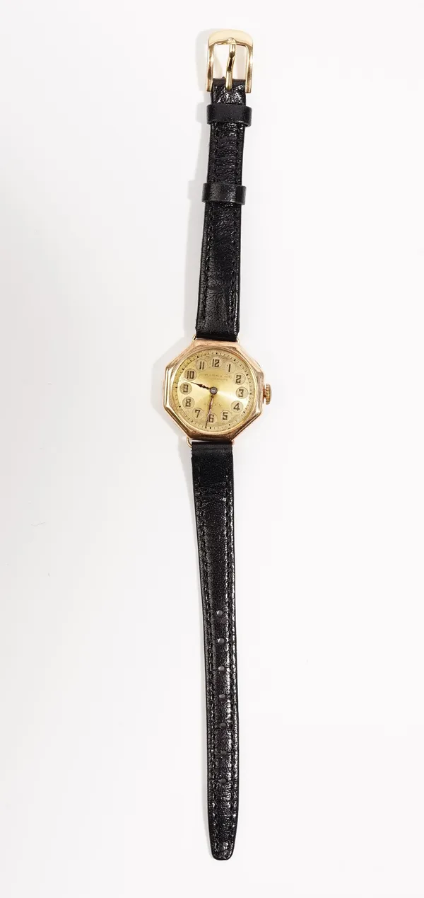 Rolex; a 9ct gold cased wristwatch, the gilt silvered dial with Arabic numbers to a 15 jewel manual wind movement, case numbered 44921, on a replaceme