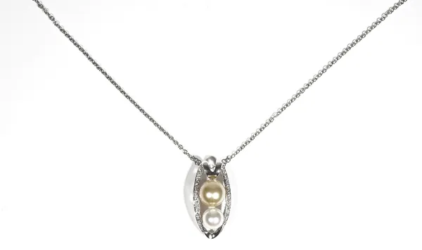 An 18ct white gold, cultured pearl and diamond-set pendant necklace, the openwork pendant set with two graduated varicoloured cultured pearls, within