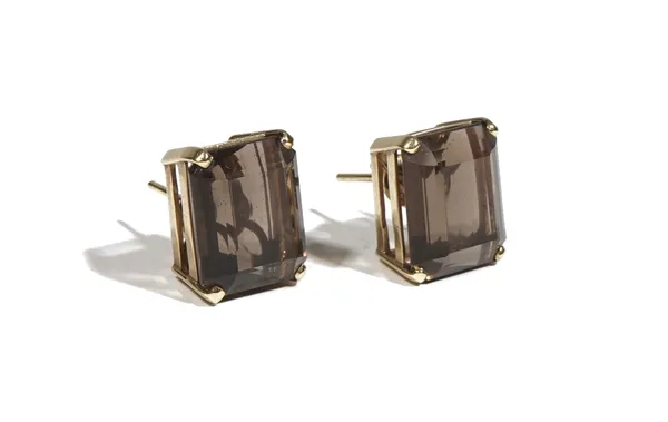 A pair of gold and smoky quartz-set earstuds, the rectangular cut-cornered step cut smoky quartz, four claw-set to gold mounts, 10g gross combined.