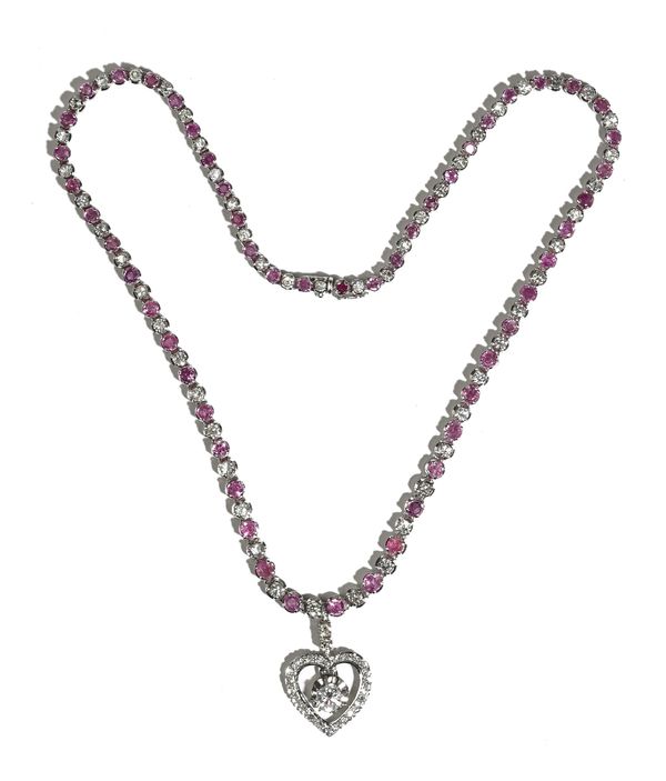 A diamond and pink sapphire pendant necklace, the front pendant drop claw set with the principal circular cut diamond to the centre, within an open he