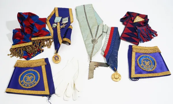 A collection of Masonic regalia and further items, mostly relating to Sussex lodges including seven ceremonial aprons, two rosettes, five sashes, thir