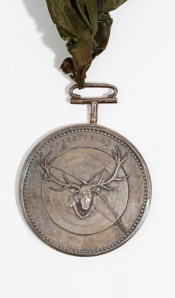 A silver Archery prize medal, detailed Derbyshire, detailed B.Wyon Del & Sc. 1823, with a fitted collar mount and suspension loop, fitted with a ribbo